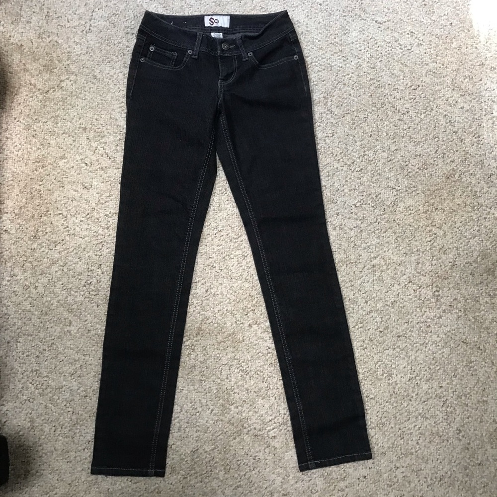 Dark Wash/Black bootcut jean.